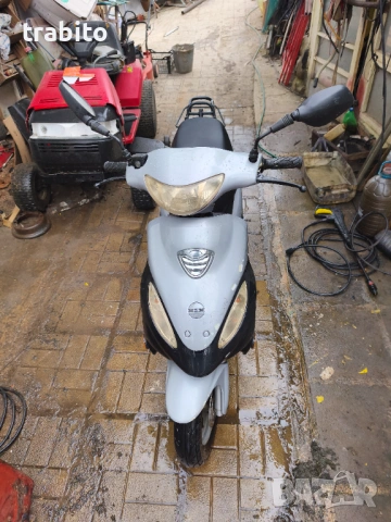 Скутер четиритактов