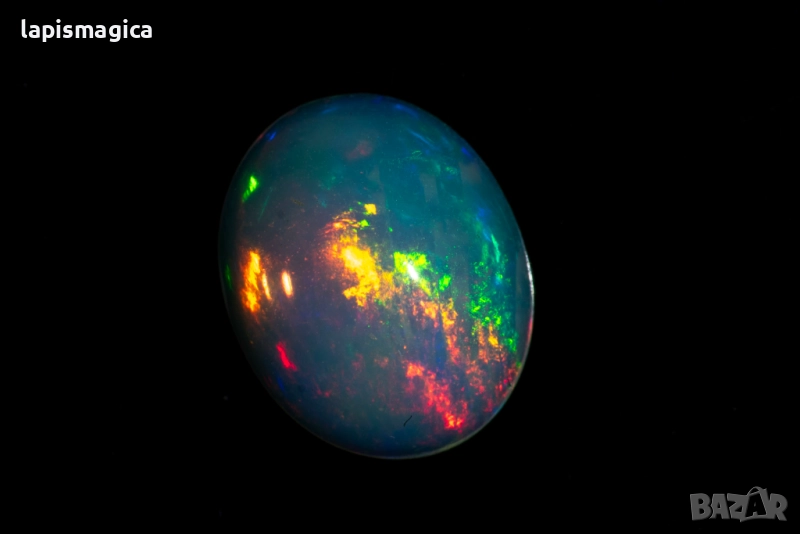 Етиопски опал 0.82ct 9x7mm овален кабошон, снимка 1