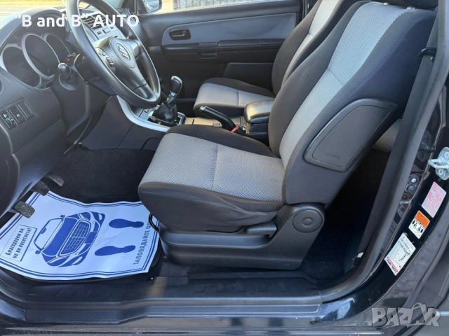 Suzuki Grand Vitara 1.9 Дизел, Климатик, 4х4, снимка 10 - Автомобили и джипове - 53053170