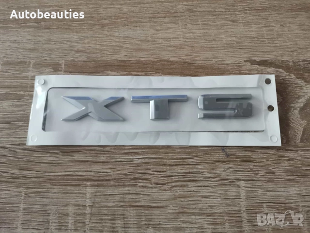 сребристо лого Cadillac XTS стар стил