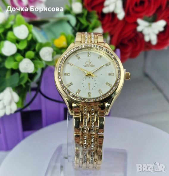 Дамски часовник Calvin Klein- златист с бял циферблат , снимка 1