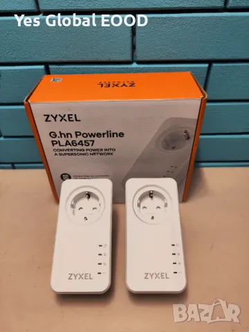 Zyxel G.hn Powerline Ethernet Адаптер – Gigabit, Pass-Through, 8K Стрийминг, 2 Бр. PLA6457, снимка 1 - Мрежови адаптери - 48492568