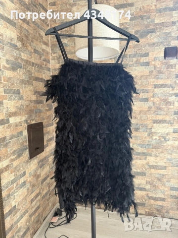 Красива и стилна рокля цялата с пера 