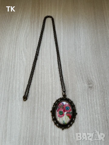 Продавам нов ръчно изработен медальон с дълга верижка