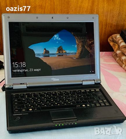 лаптоп Fujitsu 12.5 in HDD 750 gb  работи бързо