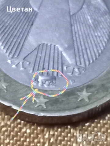 монета 1евро.