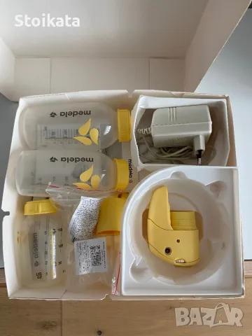 Помпа за кърма Medela Mini Electric , снимка 2 - Помпи за кърма - 46945731