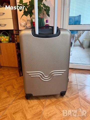 Нов Куфар с 4-ри колела за багаж AMERICAN TRAVEL Син, снимка 4 - Куфари - 44746512