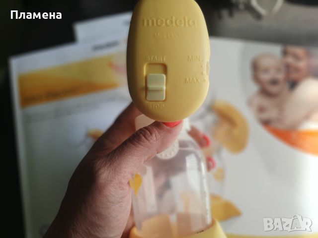 Електрическа помпа Medela Mini electric, снимка 2 - Помпи за кърма - 45605808