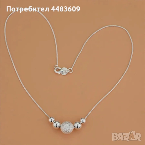 Сребърно колие с топчета 