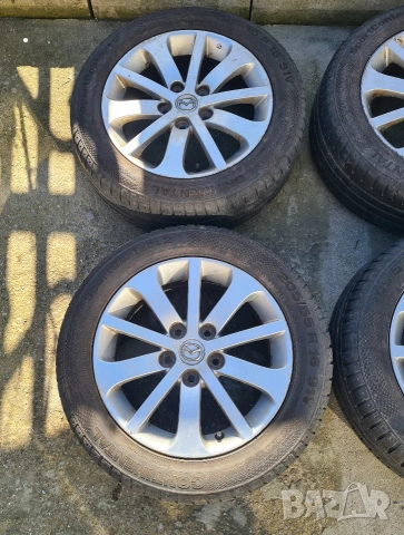 Оригинални лети джанти за Mazda 16 цола 5х114.3 с летни гуми Continental, снимка 2 - Гуми и джанти - 53669167