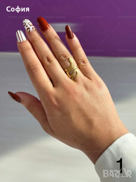 Хубав дамски златист пръстен тип змия от медицинска стомана, снимка 1