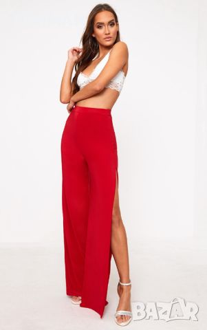 УНИКАЛЕН панталон с отворен встрани широк крачол в червен цвят , снимка 2 - Панталони - 45261905