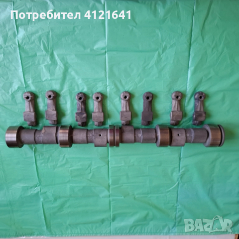Разпределителен вал за Лада, нов. Отделно 8 броя кобилици.