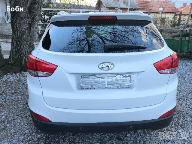 Hyundai ix35 2.0 CRDI, снимка 4 - Автомобили и джипове - 53748956