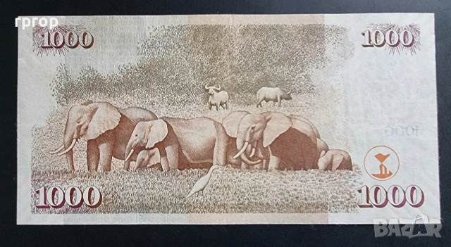 Кения. 1000 шилинга. 2005 година., снимка 3 - Нумизматика и бонистика - 48094216