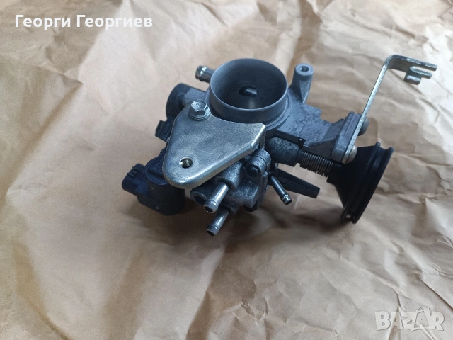 Дросел клапа Daihatsu Sirion 1.3 2005, снимка 2 - Части - 53960543