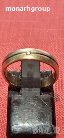 Златен пръстен с диамант