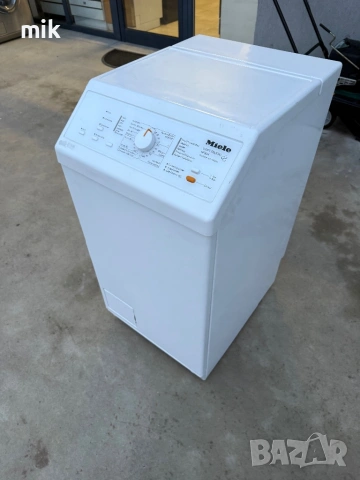 Пералня с горно зареждане Миеле Пчелна пита 