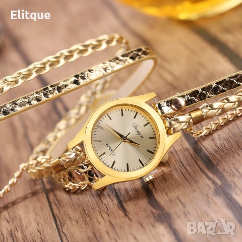 Дамски ръчен часовник тип гривна с верижки за увиване около китката. Цветове - бял или златен.