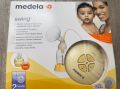 Двуфазна електрическа помпа за кърма Medela Swing, снимка 1