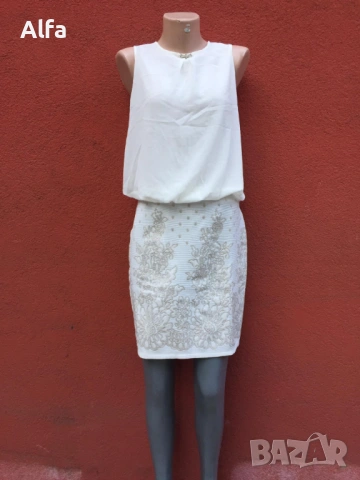 Елегантна бяла рокля с бродерия