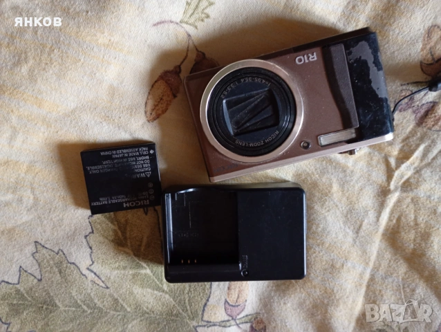 Предлагам повреден фотоапарат Ricoh R10