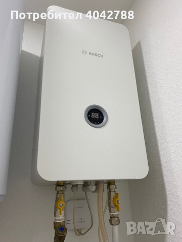 продавам Bosch, ел. котел TRONIC HEAT 3500 9 kW използван е само една година 2200 със 4 ри радиатора, снимка 1 - Отоплителни печки - 44937883