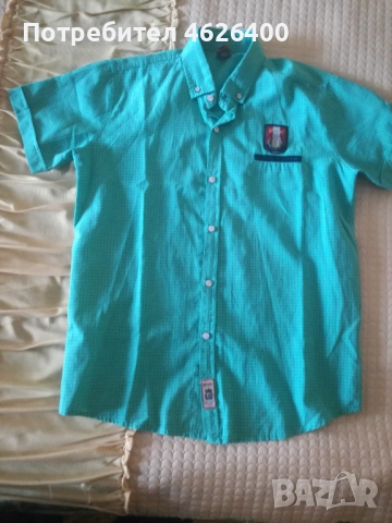 Продавам детска зелена ризка на черни точици маркова