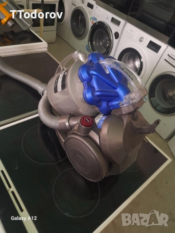 Прахосмукачка с контейнер Dyson DC29, 1400 W , снимка 4 - Прахосмукачки - 52617231