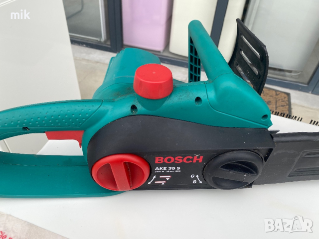 Електрически верижен трион Bosch, снимка 2 - Градинска техника - 45052144