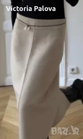 Стилна дълга бежова пола с цип отпред