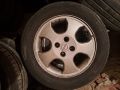 Летни гуми Таурус с алуминиеви джанти 195/65/15 - 4 бр, снимка 1 - Гуми и джанти - 45270121