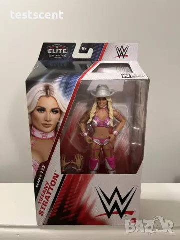 Екшън фигура WWE Tiffany Stratton Тифани Стратън Elite Series Boxed figure играчка, снимка 9 - Колекции - 49413653