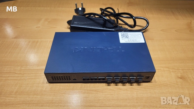 10Gigabit TP-Link TL-STIOO8F Unmanaged Ethernet Switch 8 SFP+ Optical Ports, 10GbE, снимка 2 - Рутери - 52845528