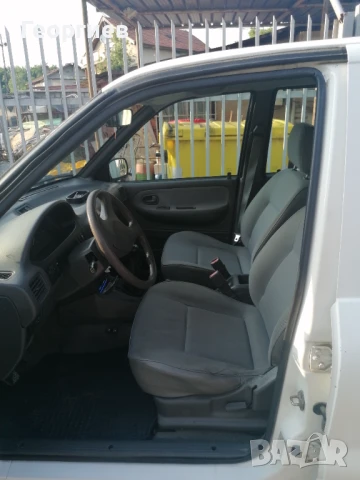 Kia Sportage - 2.0 газ / бензин, снимка 7 - Автомобили и джипове - 50507666