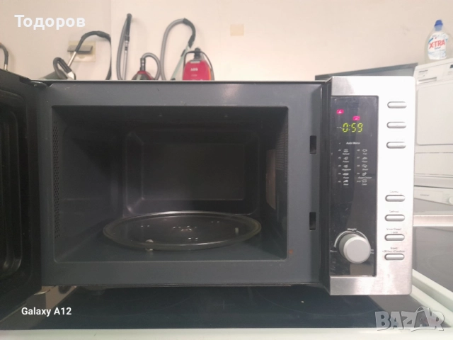 Микровълнова печка с грил Clatronic , снимка 2 - Микровълнови - 51710706