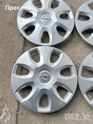 4 броя оригинални тасове за Opel Corsa D 15, снимка 2 - Аксесоари и консумативи - 53190359