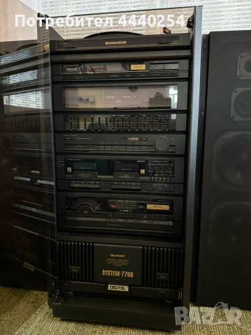 Система Sharp 7700