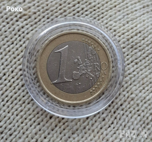 Рядкка Монета от 1 евро Испания 2003г