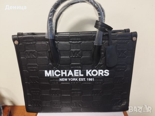 Голяма чанта на Майкъл Корс има си и дълга дръжка 