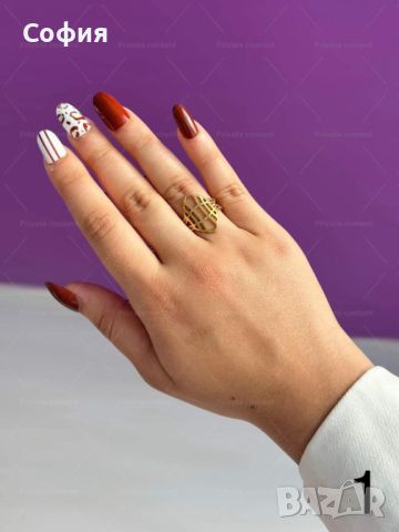 Дамски пръстен от неръждаема стомана със златисто покритие и красива текстура, снимка 1 - Пръстени - 46157860