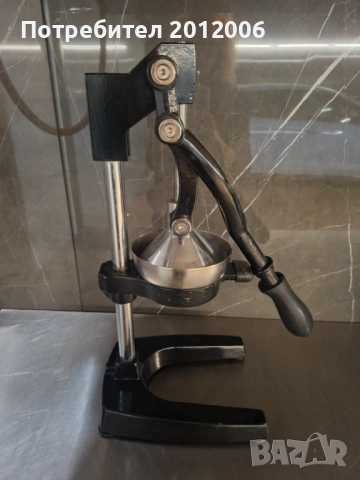 Ръчна цитрус преса