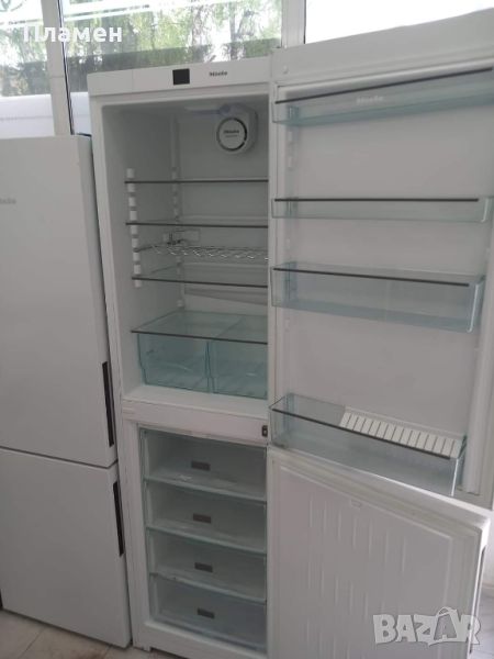 Хладилник с фризер MIELE

Допълнителна информация
Свободностоящ комбиниран хладилник Miele 
, снимка 1