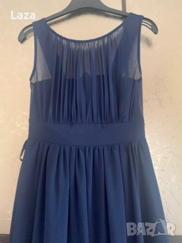 Продавам елегантна ,ефирна синя рокля 