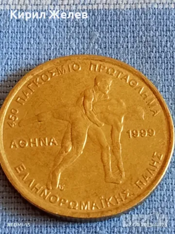 Монета 100 драхми 1999г. Гърция 45 Световно първенство по борба Атина 34328, снимка 4 - Нумизматика и бонистика - 49991737