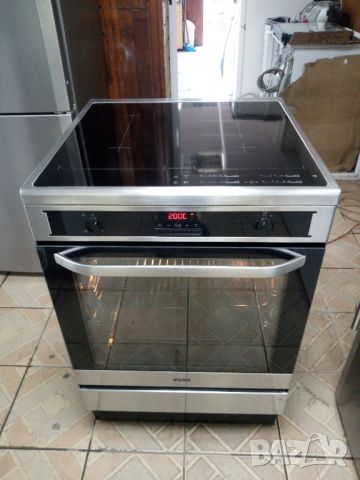 Иноксова свободно стояща печка с индукционни котлони Voss 60 см широка 2 години гаранция!