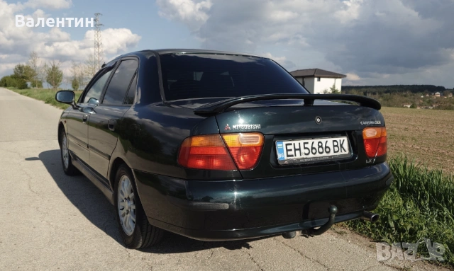 Продавам автомобил Mitsubishi Carisma  , снимка 9 - Автомобили и джипове - 54287441