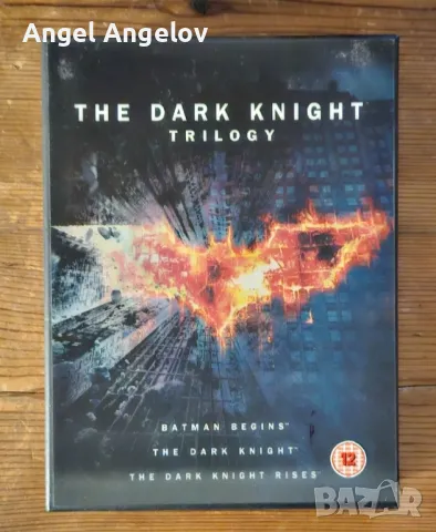 The Dark Knight Trilogy (DVD) – Complete with Booklet, No Holographic Sleeve , снимка 1 - DVD филми - 49223824