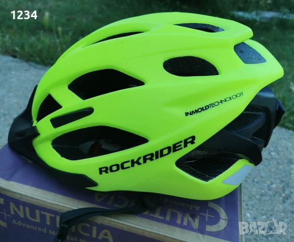 НОВА КАСКА за велосипед ROCKRIDER ST500 FLUO 320грама 59-61см, снимка 1 - Аксесоари за велосипеди - 46360334